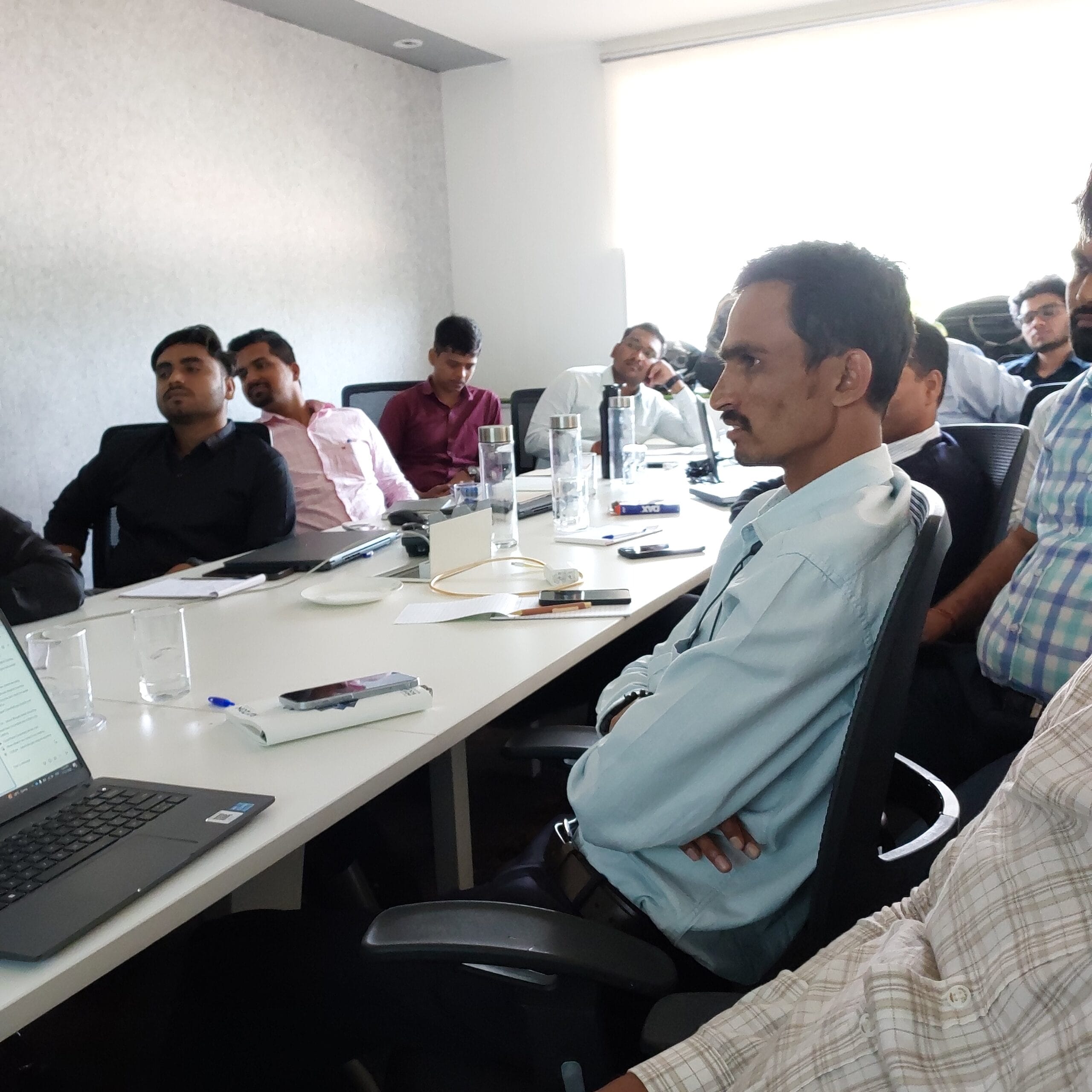 Engineers participating in a technical workshop